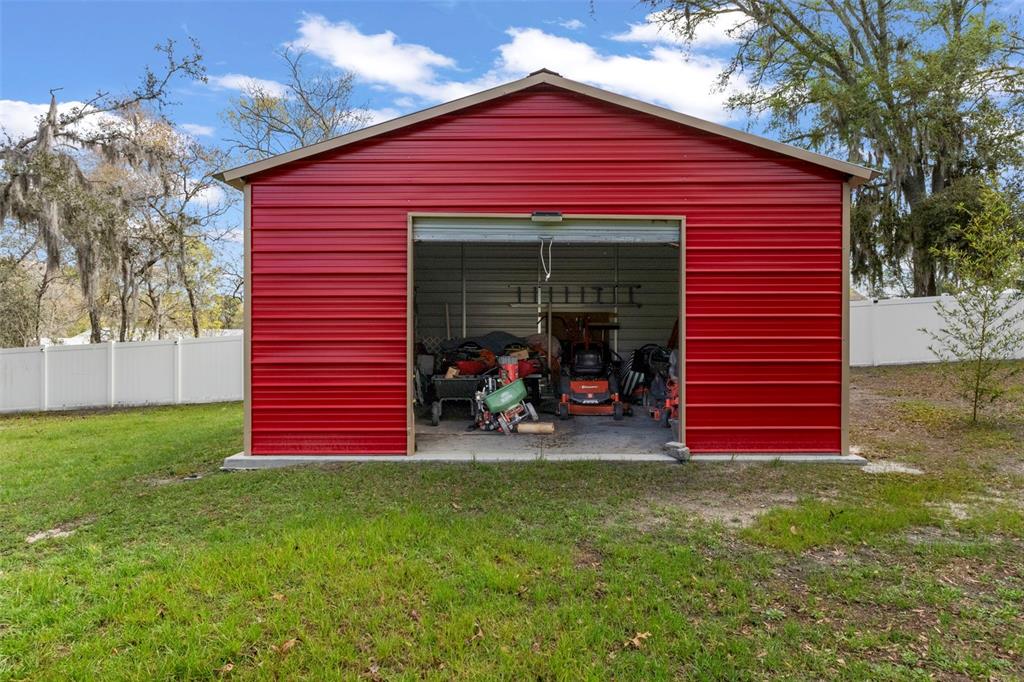 1378 Matthew Avenue Spring Hill, FL 34609 - Photo 41 of 56 a view of a house with a backyard
