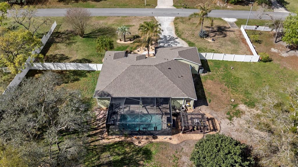 1378 Matthew Avenue Spring Hill, FL 34609 - Photo 48 of 56 an aerial view of a house with a yard basket ball court and outdoor seating