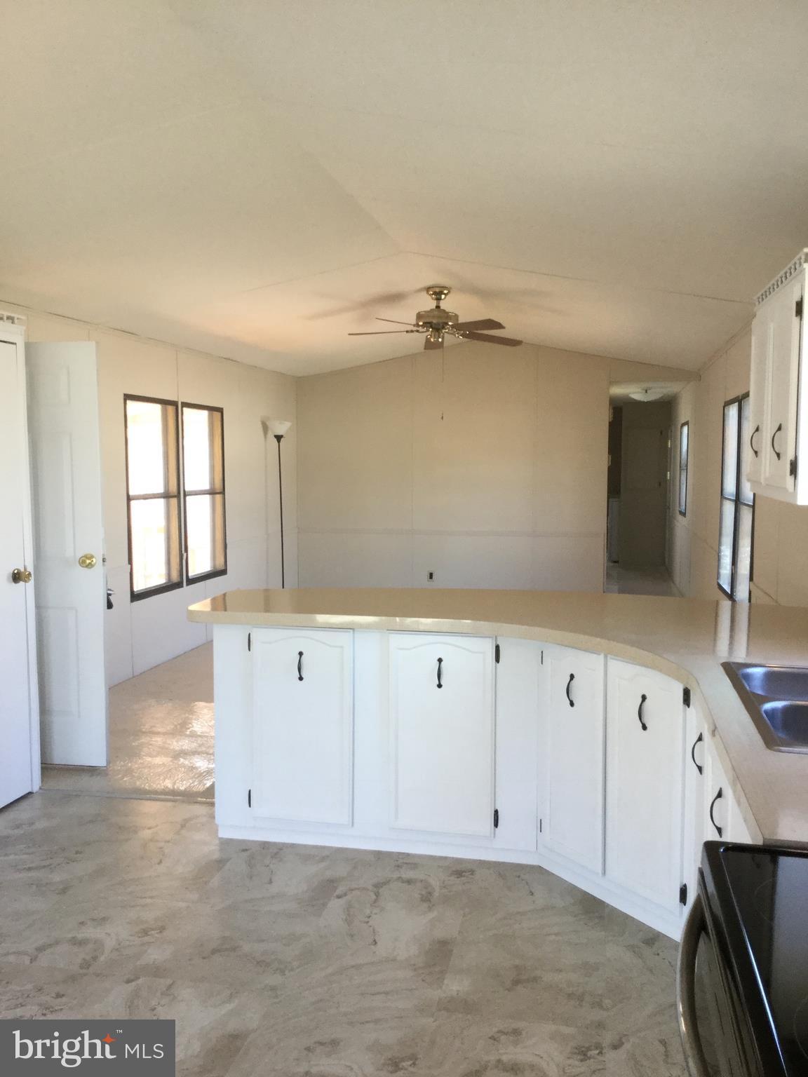109 Rodeo Circle Middle River, MD 21220 - Photo 10 of 24 an empty room with windows
