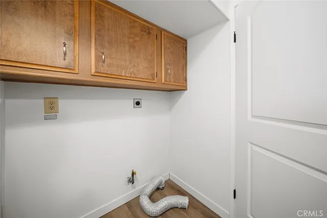 a view of a patio with wooden floor