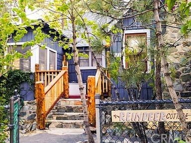 1677 Thrush Road Wrightwood, CA 92397 - Photo 1 of 1 a view of street along with trees