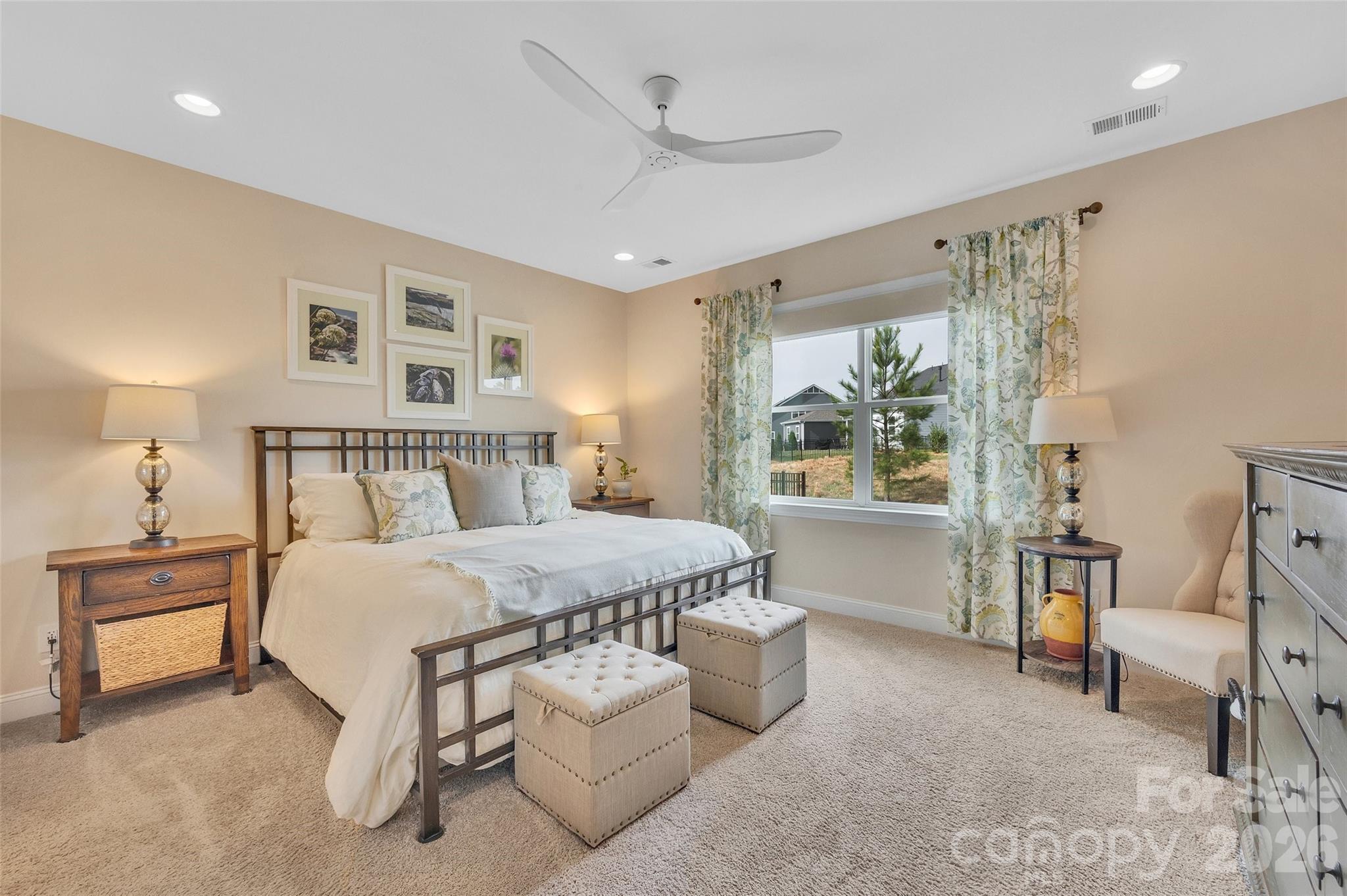 6243 Scuttle Lane Denver, NC 28037 - Photo 14 of 34 a bedroom with a large bed and a window