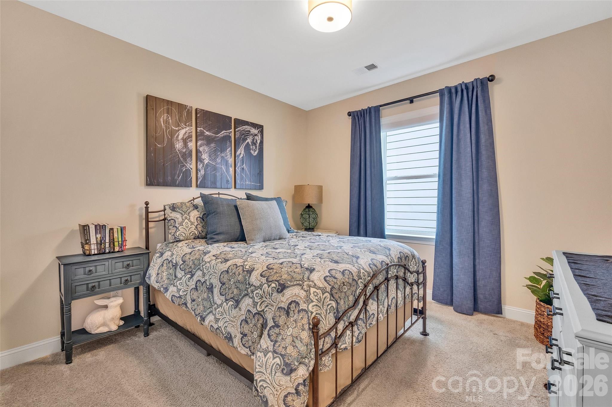 6243 Scuttle Lane Denver, NC 28037 - Photo 18 of 34 a bedroom with a bed and a window