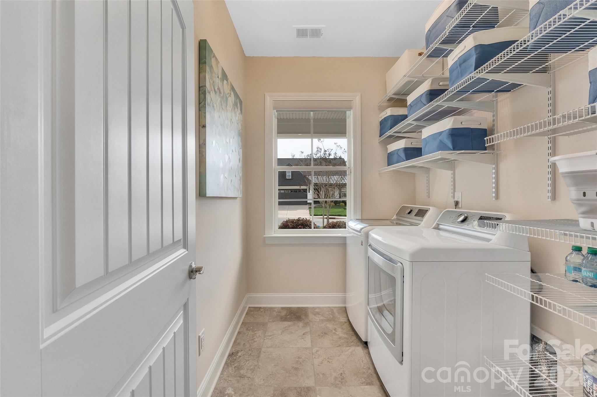 6243 Scuttle Lane Denver, NC 28037 - Photo 20 of 34 a kitchen with a sink and a stove top oven