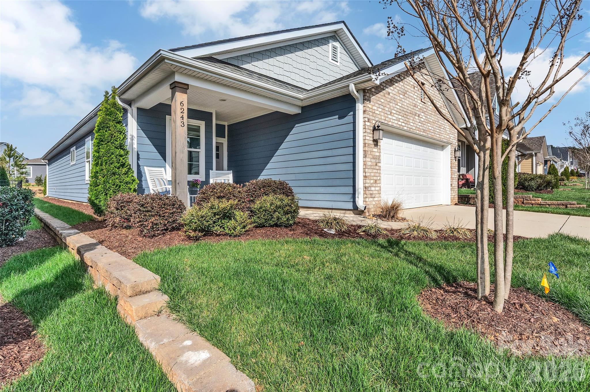 6243 Scuttle Lane Denver, NC 28037 - Photo 2 of 34 a view of a house with a yard and pathway