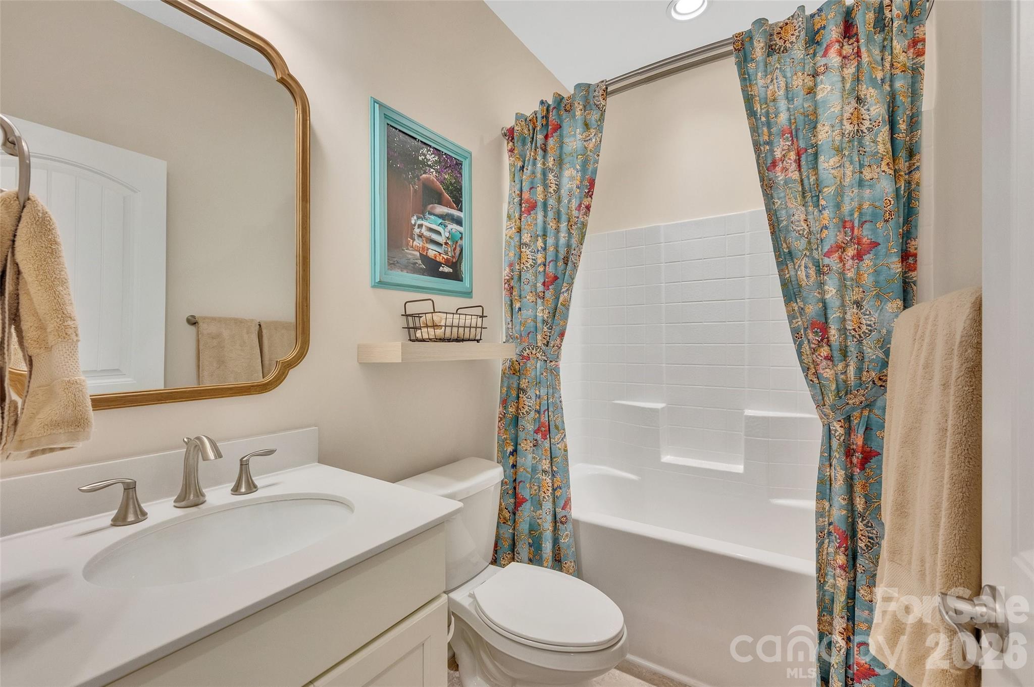 6243 Scuttle Lane Denver, NC 28037 - Photo 21 of 34 a bathroom with a sink toilet and shower