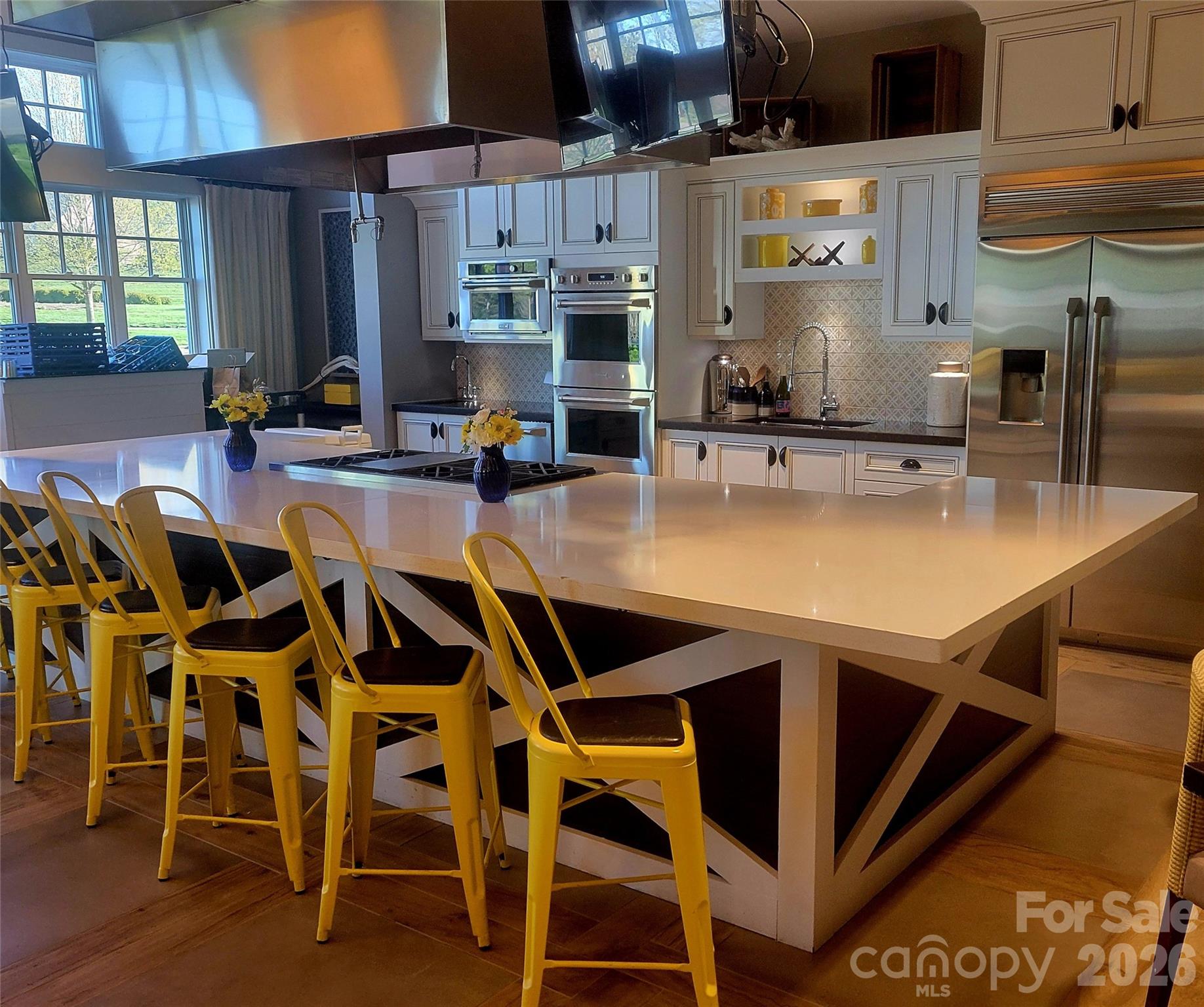6243 Scuttle Lane Denver, NC 28037 - Photo 32 of 34 a view of kitchen with cabinets and wooden floor