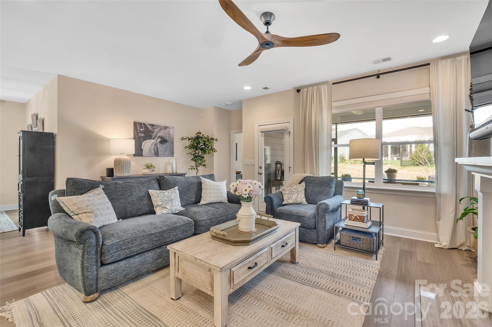 6243 Scuttle Lane Denver, NC 28037 - Photo 7 of 34 a living room with furniture and a large window