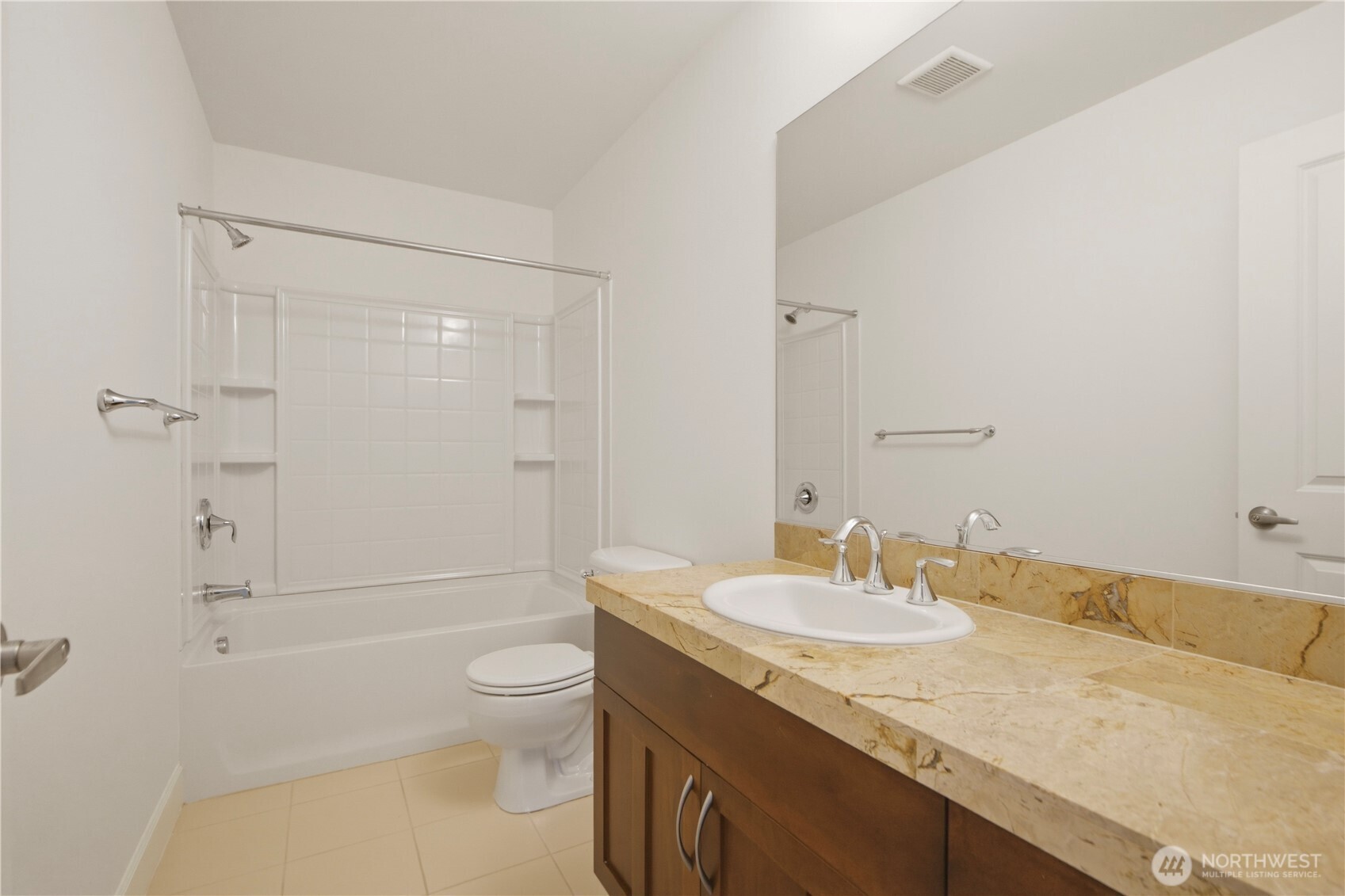 2115 201st Place Southeast, Unit B2 Bothell, WA 98012 - Photo 14 of 24 a bathroom with a granite countertop sink a toilet and shower