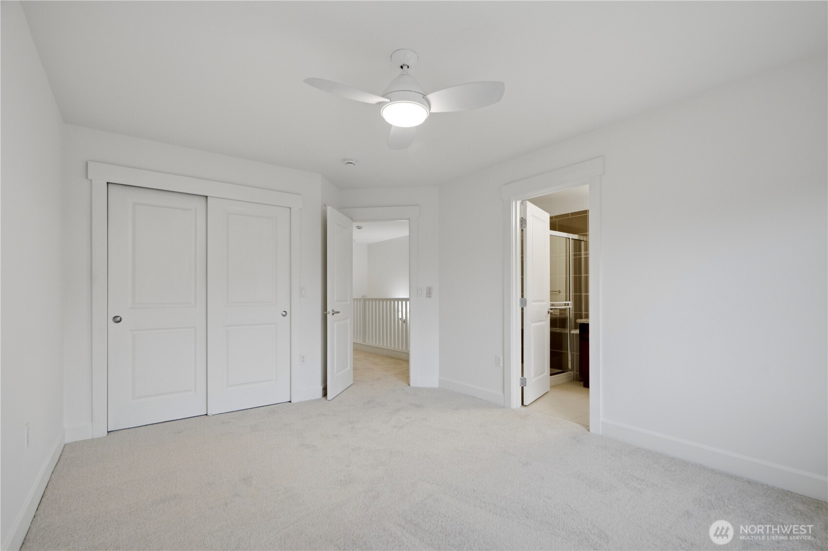 2115 201st Place Southeast, Unit B2 Bothell, WA 98012 - Photo 17 of 24 a view of an empty room and a bathroom