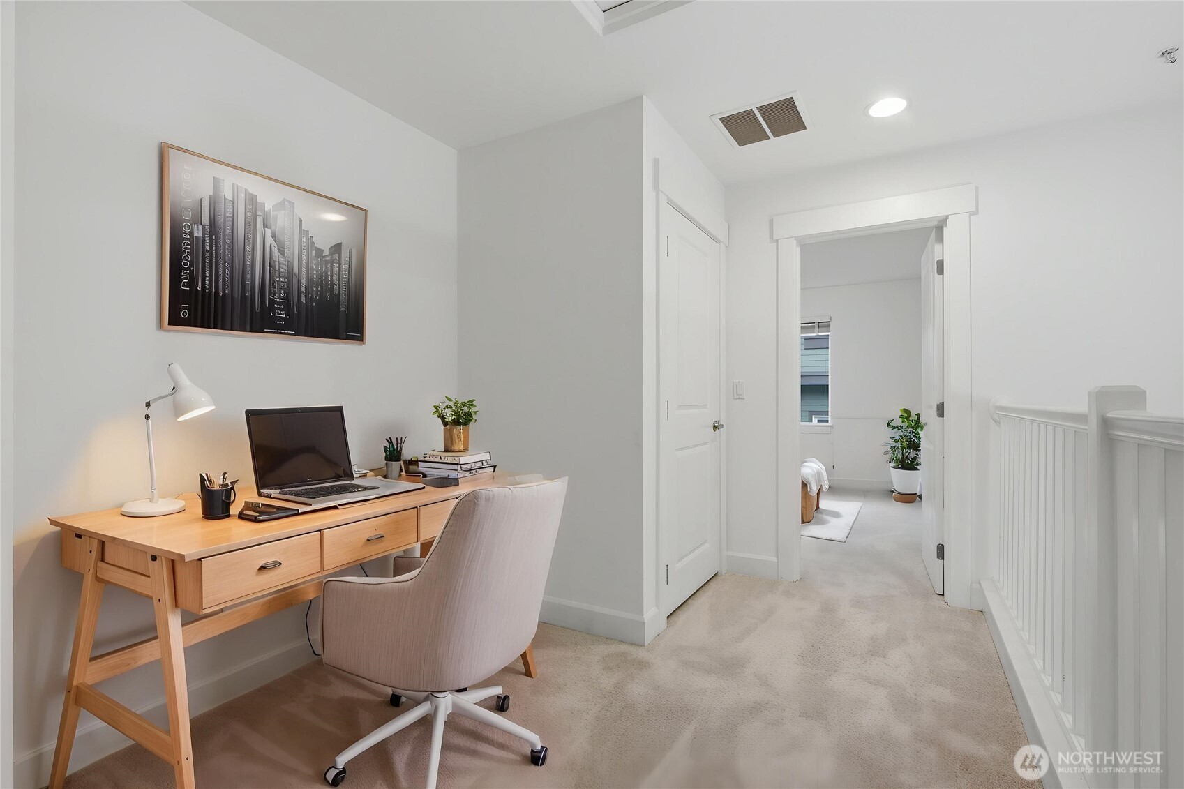 2115 201st Place Southeast, Unit B2 Bothell, WA 98012 - Photo 20 of 24 a workspace with furniture and mirror