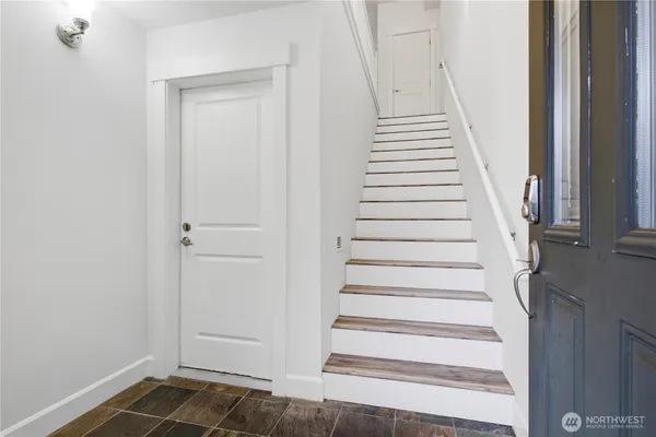 a view of an entryway with staircase