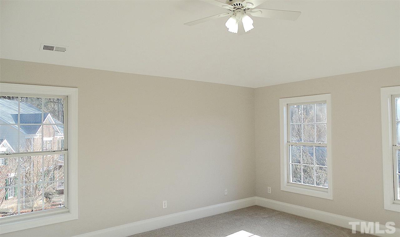10404 Veasey Mill Road Raleigh, NC 27615 - Photo 11 of 30 a view of an empty room with a window