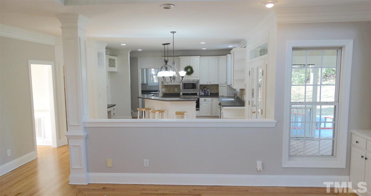 10404 Veasey Mill Road Raleigh, NC 27615 - Photo 26 of 30 a view of kitchen with stainless steel appliances granite countertop sink and window