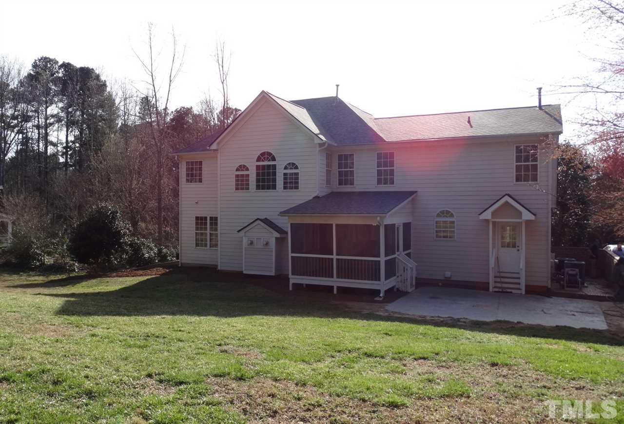 10404 Veasey Mill Road Raleigh, NC 27615 - Photo 30 of 30 a front view of a house with a yard