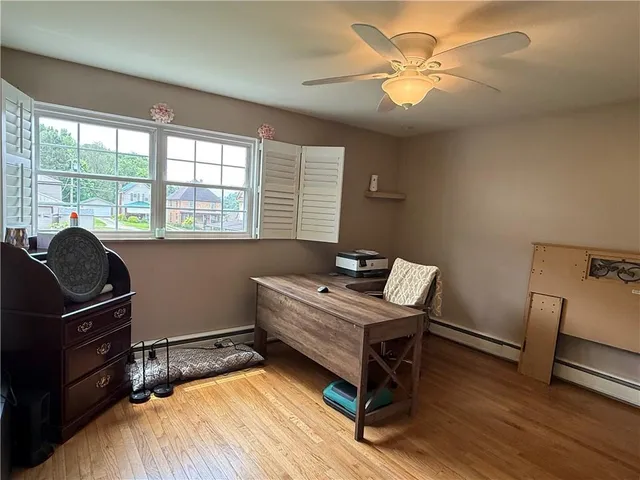 a room with gym equipment and a window