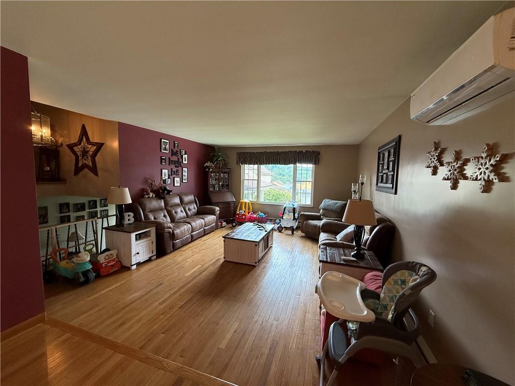 570 Hancock Street Clymer, PA 15728 - Photo 9 of 33 a living room with furniture and wooden floor