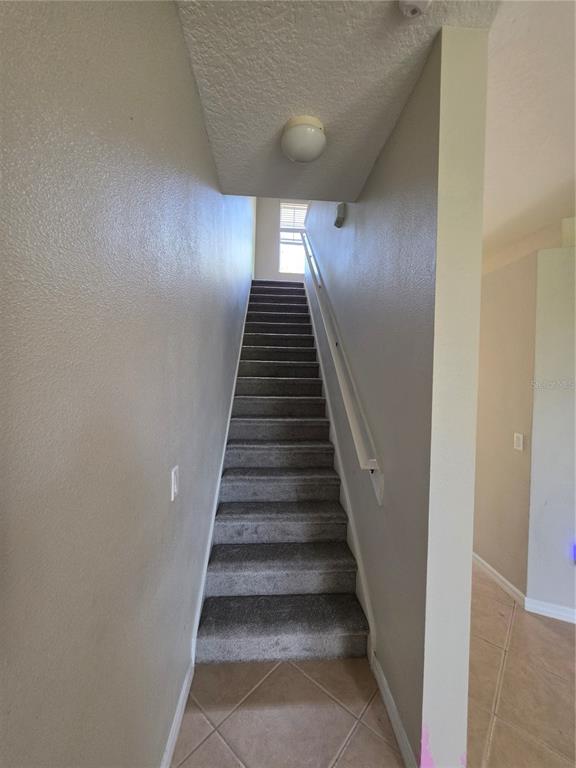 708 Fortanini Circle Ocoee, FL 34761 - Photo 23 of 32 a view of entryway and hall with wooden floor