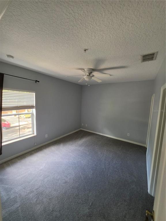 708 Fortanini Circle Ocoee, FL 34761 - Photo 29 of 32 a view of a room that has a window in it