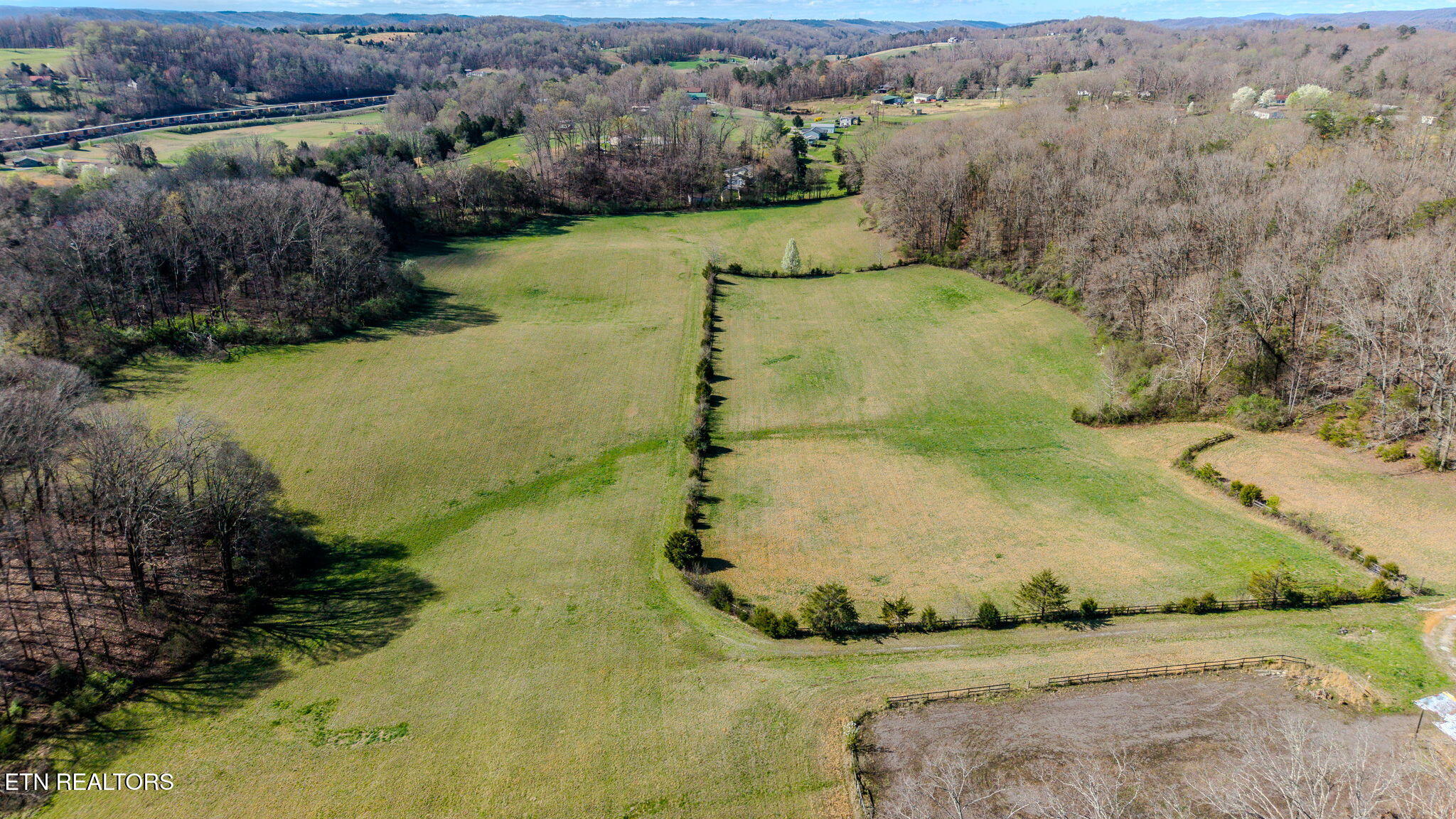 243 Black Oak Road Clinton, TN 37716 - Photo 4 of 49 8-web-or-mls-DJI_20260312113241_0078_D