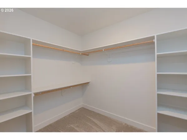 a view of an empty walk in closet