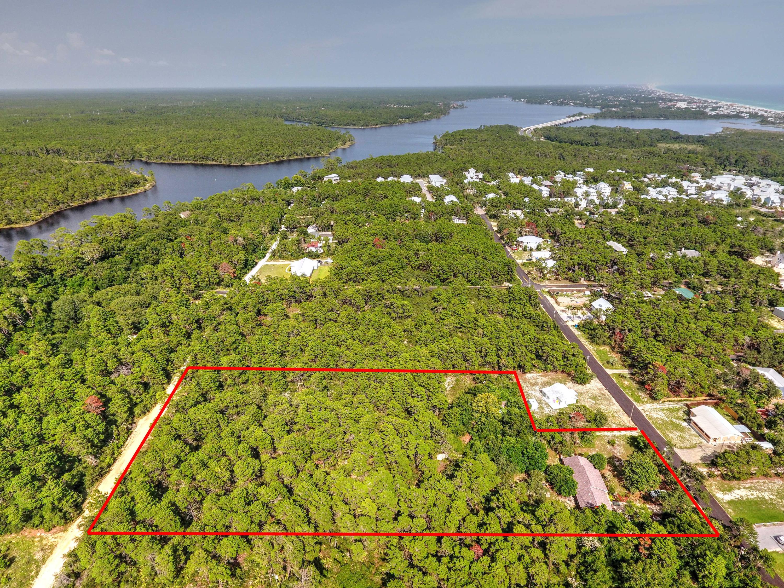 143 Walton Palm Road Inlet Beach, FL 32461 - Photo 3 of 10 a view of lake with green space