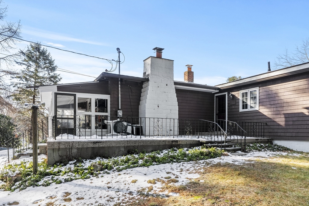 115 Kennedy Road Stoughton, MA 02072 - Photo 2 of 42 a front view of a house with garden