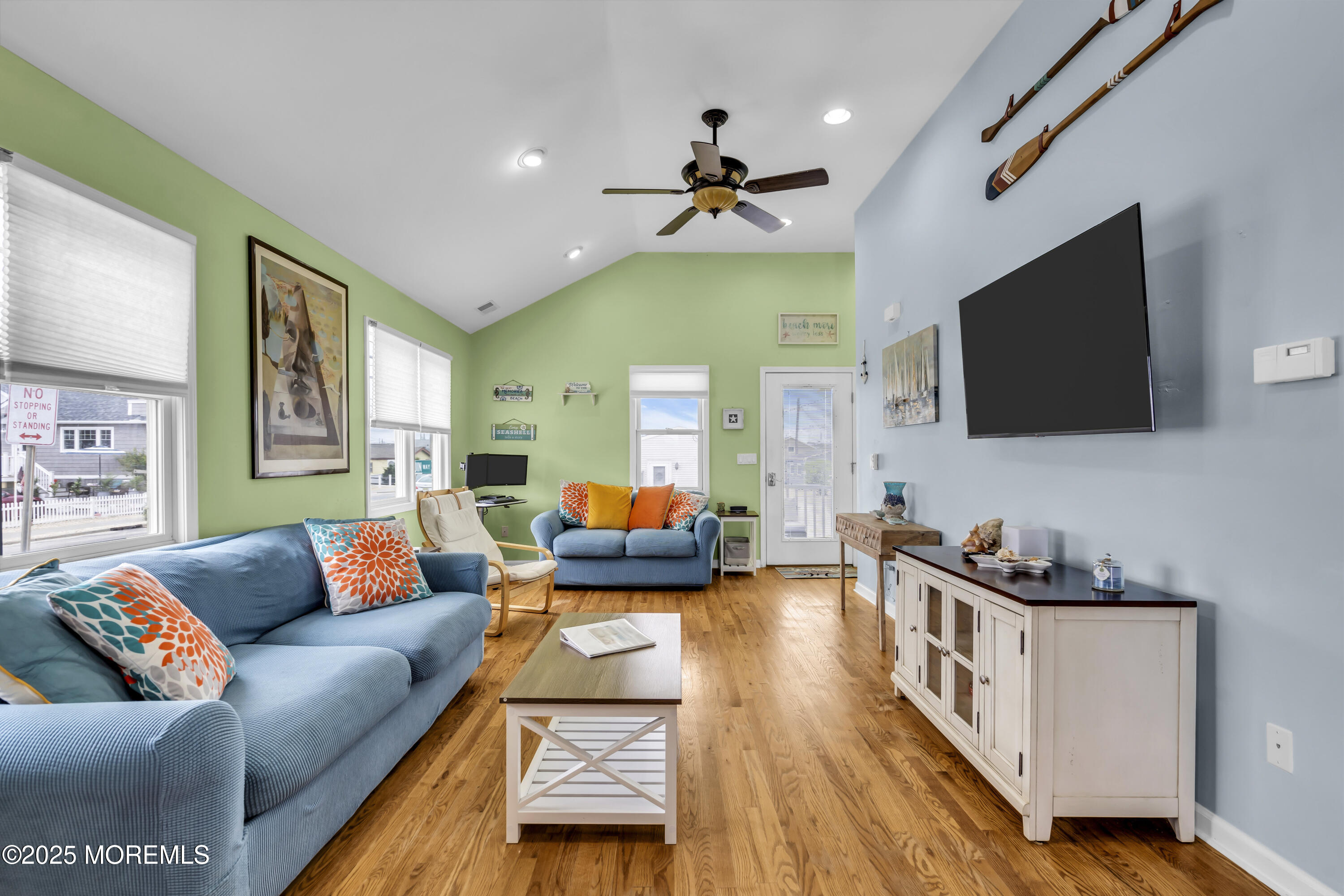 39 East Penguin Way Lavallette, NJ 08735 - Photo 11 of 29 a living room with furniture and a flat screen tv