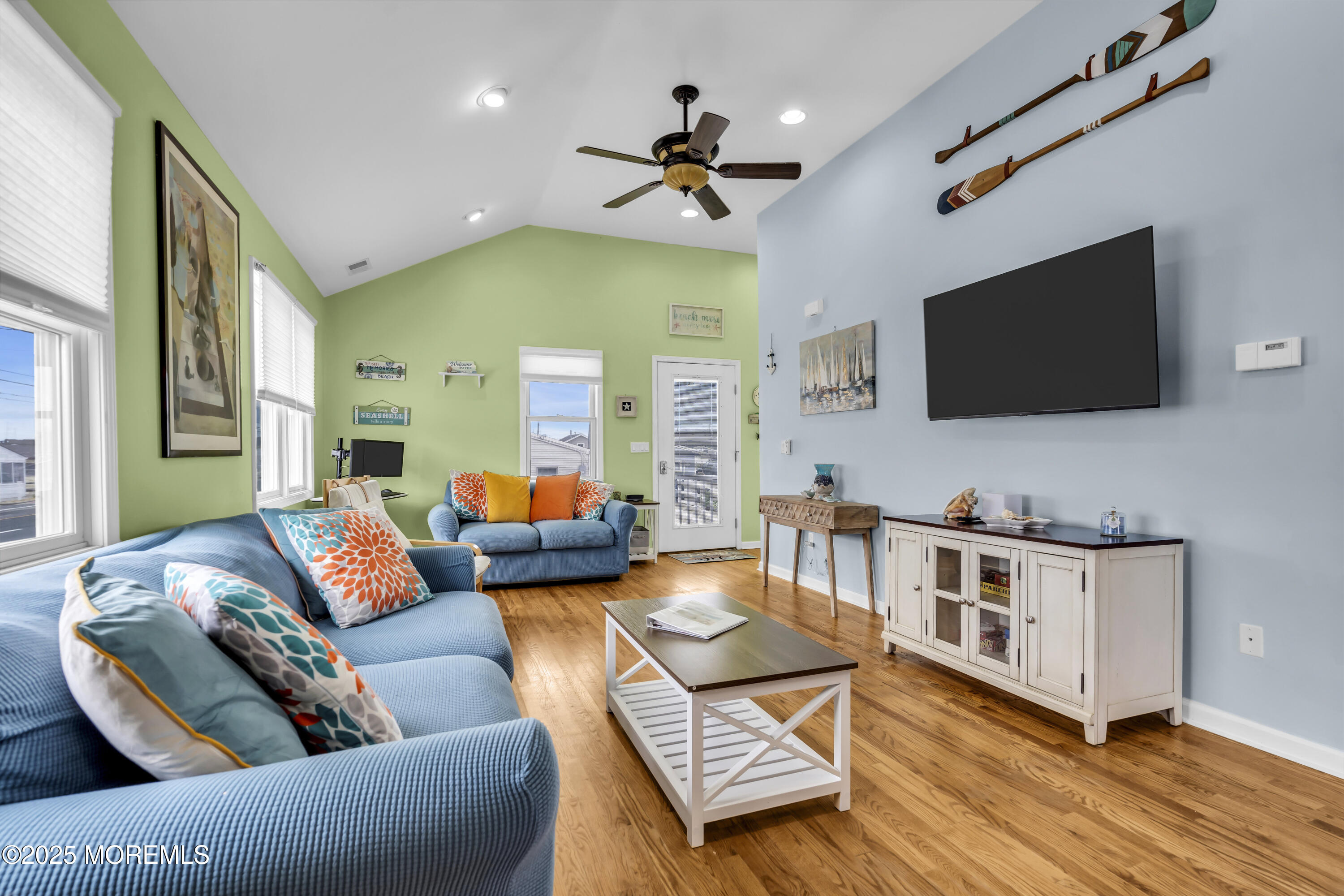 39 East Penguin Way Lavallette, NJ 08735 - Photo 12 of 29 a living room with furniture and a flat screen tv
