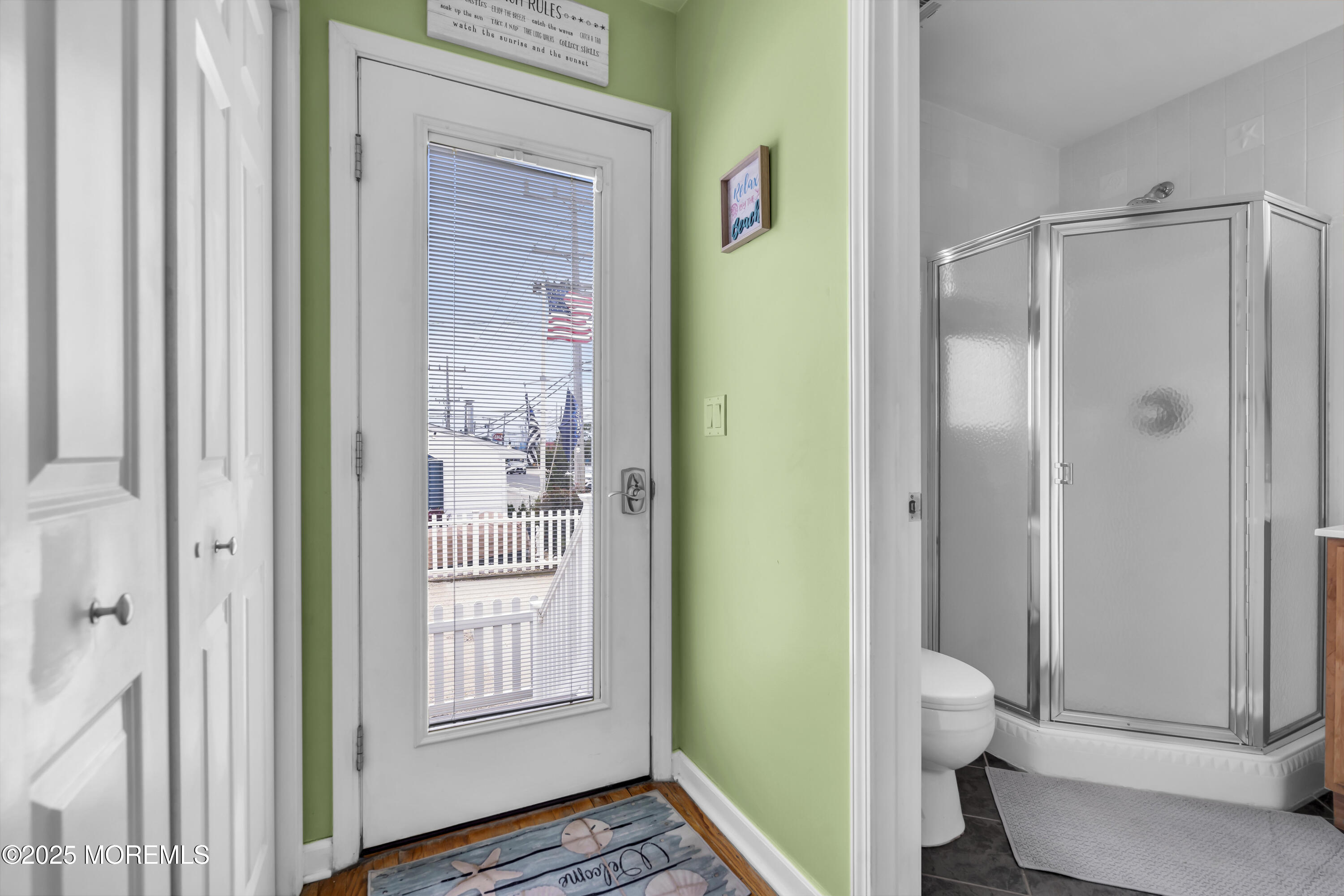 39 East Penguin Way Lavallette, NJ 08735 - Photo 17 of 29 a bathroom with a shower and a toilet