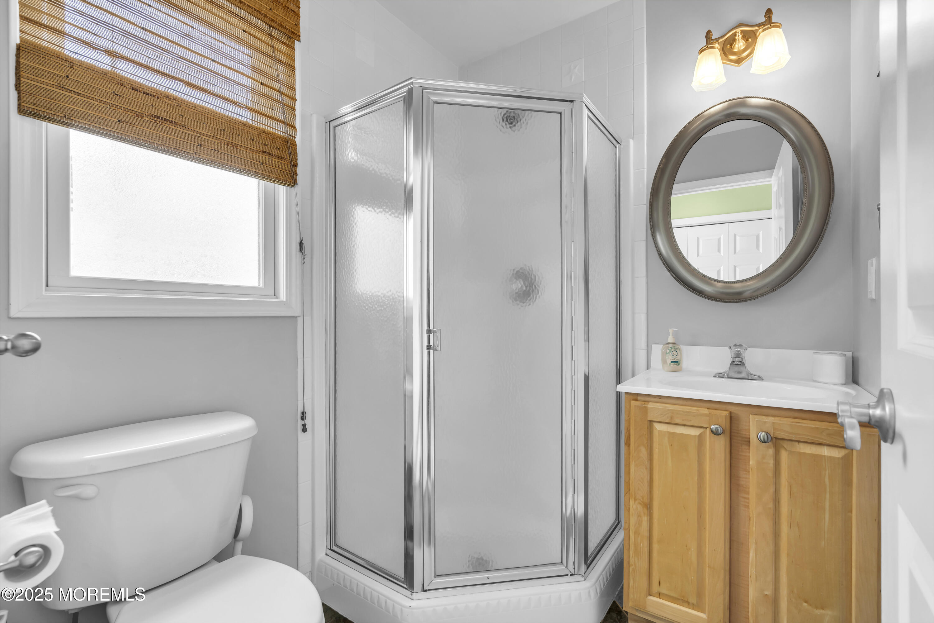 39 East Penguin Way Lavallette, NJ 08735 - Photo 18 of 29 a bathroom with a toilet and a sink