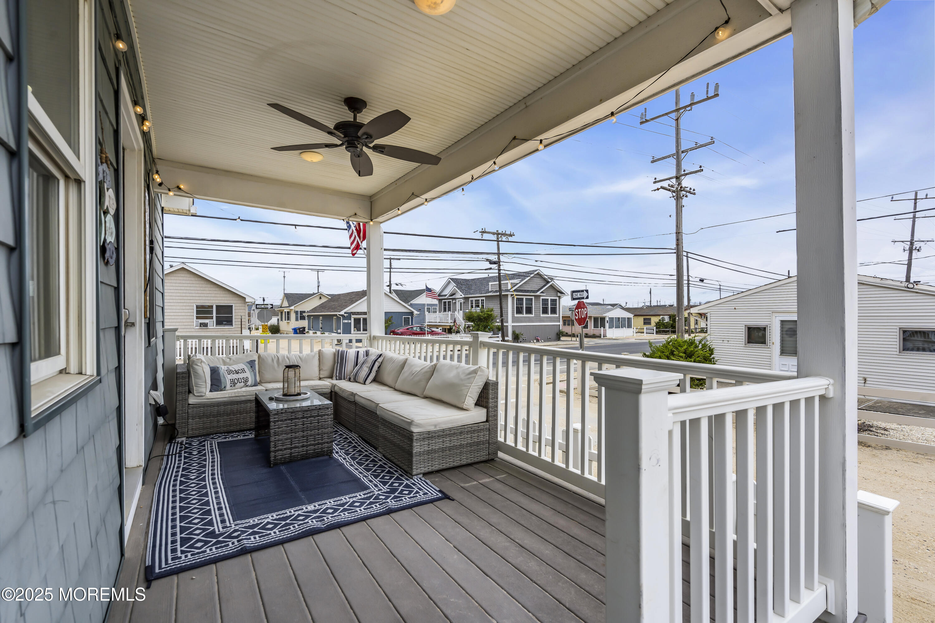 39 East Penguin Way Lavallette, NJ 08735 - Photo 3 of 29 a view of a deck with couches table and chairs