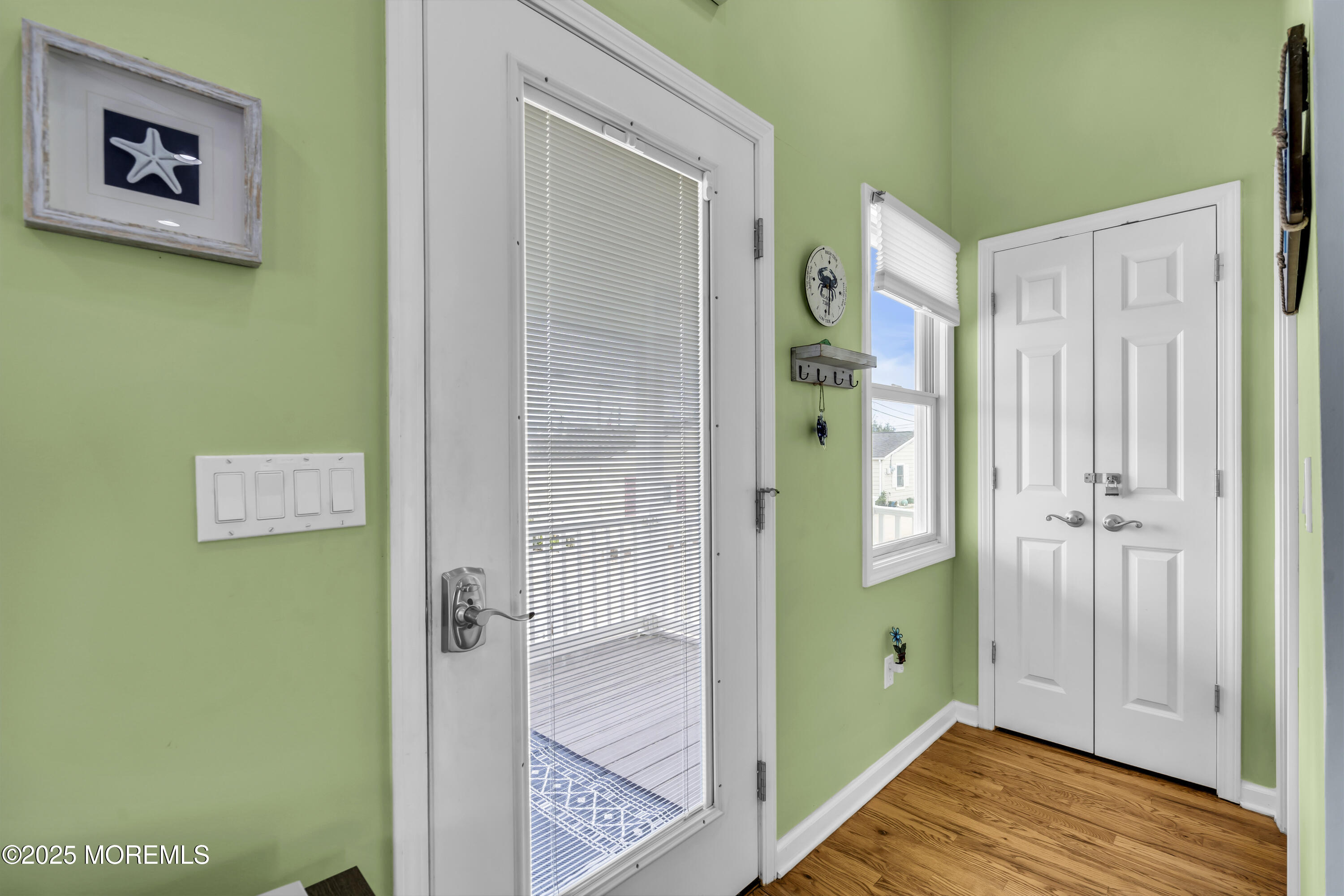 39 East Penguin Way Lavallette, NJ 08735 - Photo 7 of 29 a view of a bathroom with a sink and a mirror