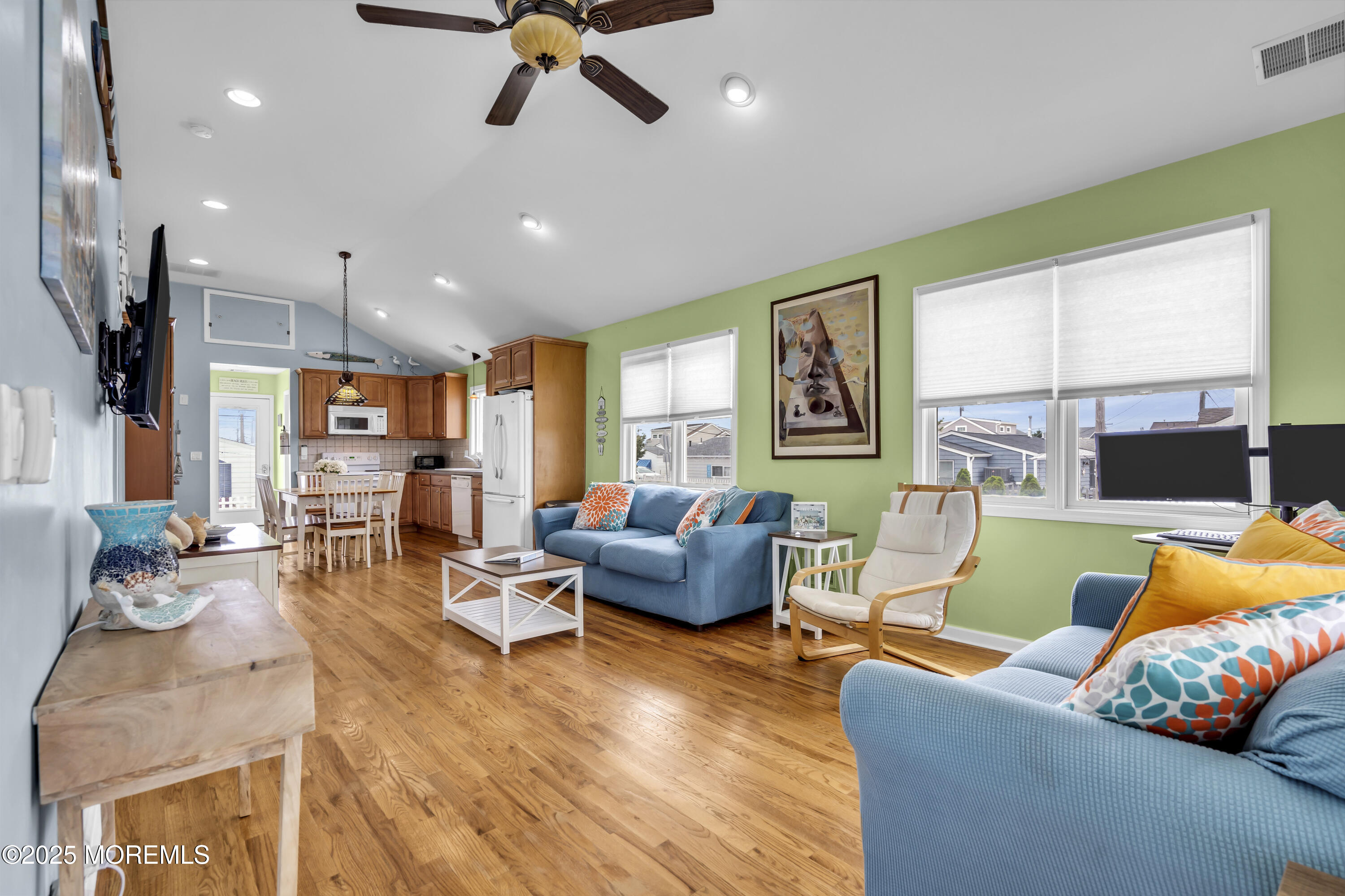 39 East Penguin Way Lavallette, NJ 08735 - Photo 8 of 29 a living room with furniture and a large window