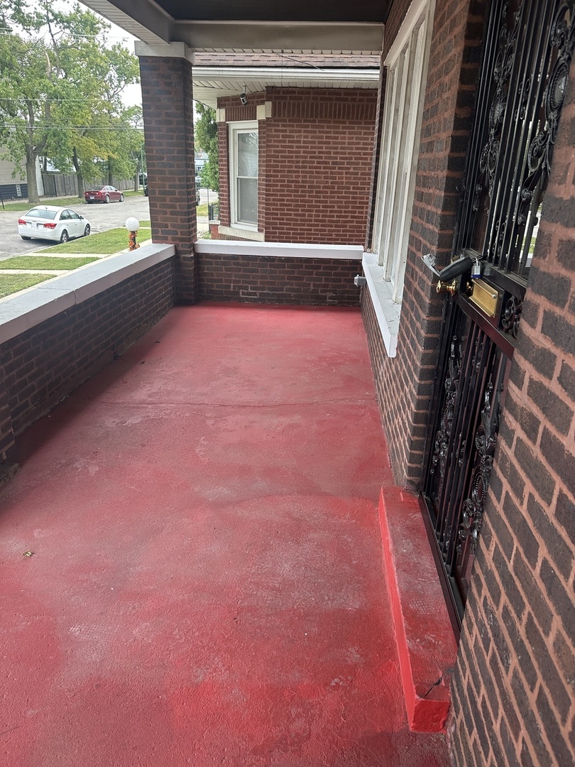 8634 South Carpenter Street Chicago, IL 60620 - Photo 2 of 28 a view of backyard with a small pool and a couch