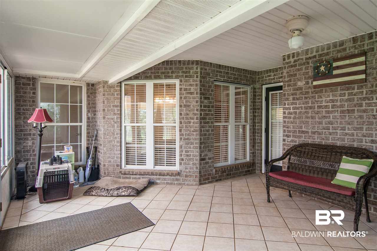 22165 Buck Road Robertsdale, AL 36567 - Photo 31 of 39 Sunroom