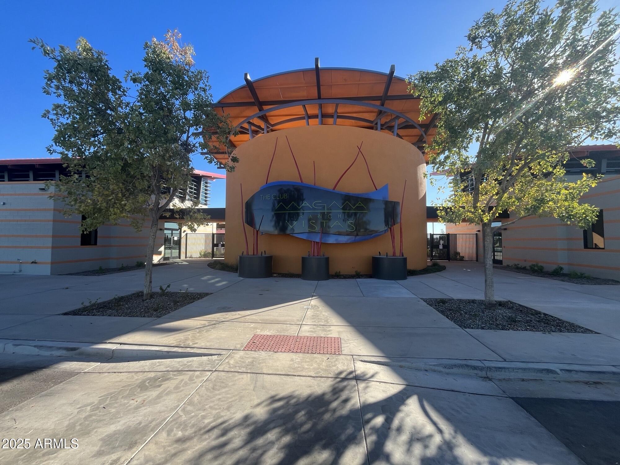13277 East Wallflower Lane Florence, AZ 85132 - Photo 3 of 11 a view of a house with a yard