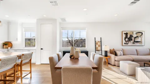 a living room with furniture and a table