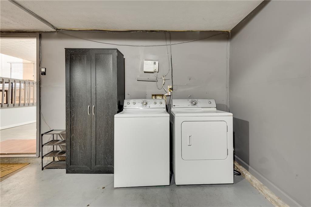 5611 Whittondale Road Lithonia, GA 30058 - Photo 26 of 34 a utility room with dryer and washer