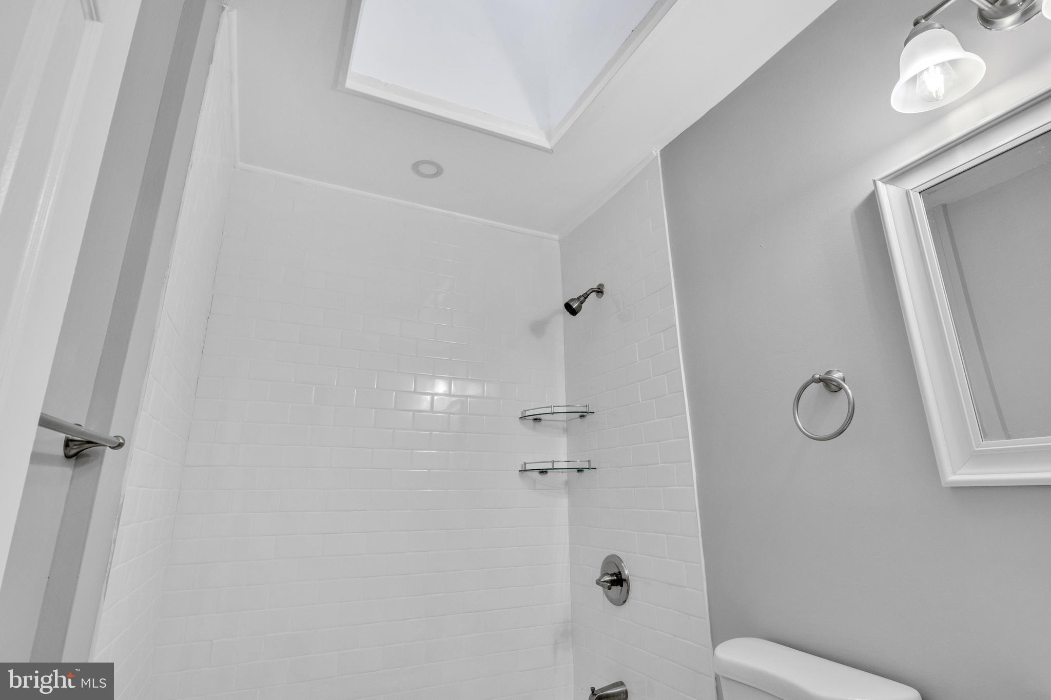 3606 Manchester Avenue Baltimore, MD 21215 - Photo 13 of 21 a bathroom with a shower