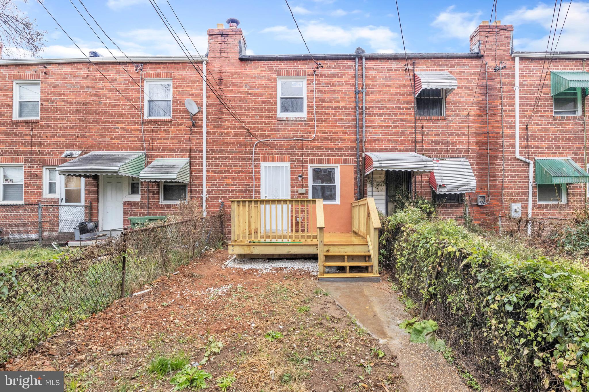 3606 Manchester Avenue Baltimore, MD 21215 - Photo 20 of 21 front view of a house with a yard