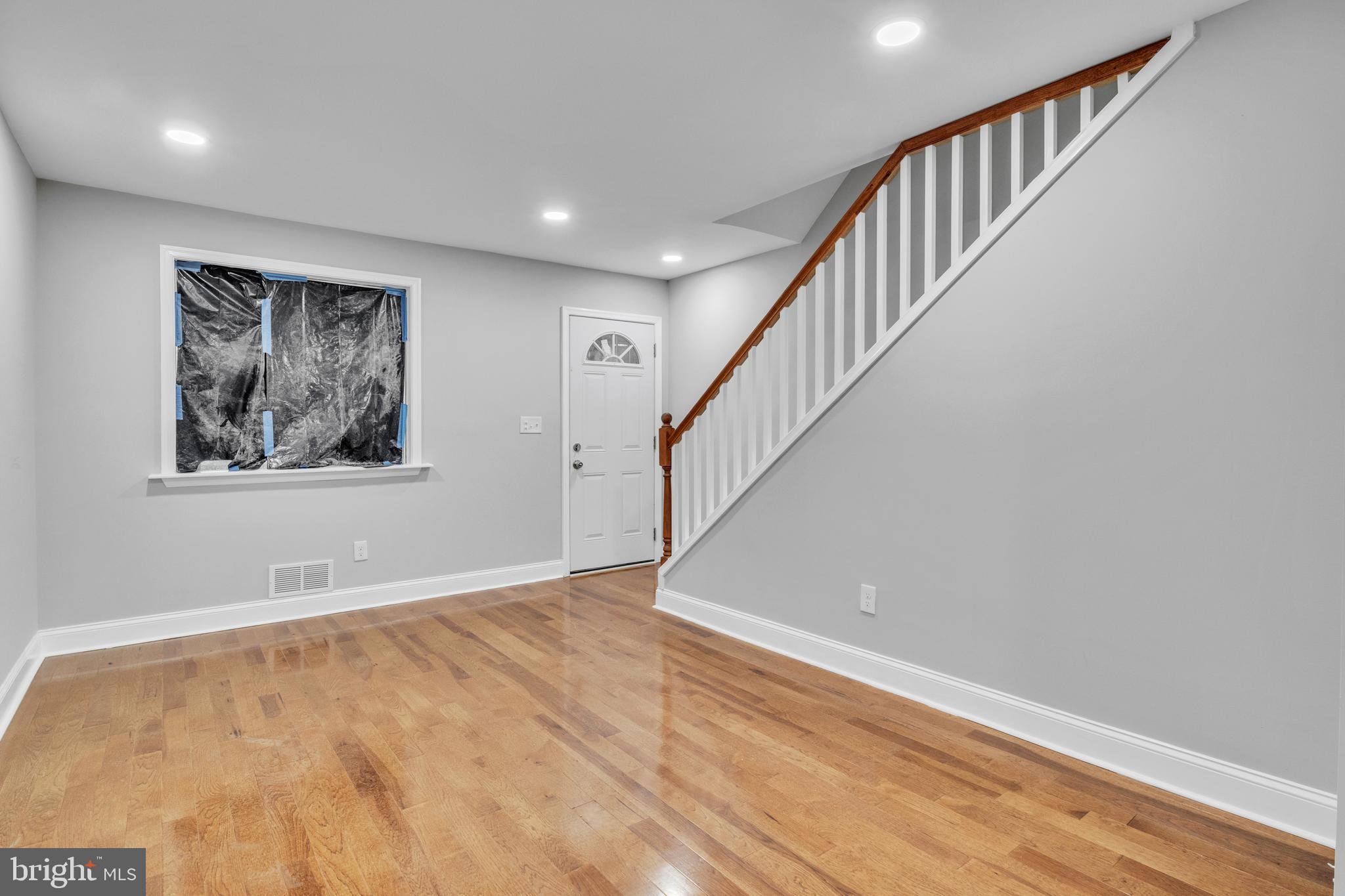3606 Manchester Avenue Baltimore, MD 21215 - Photo 2 of 21 a view of an entryway with wooden floor