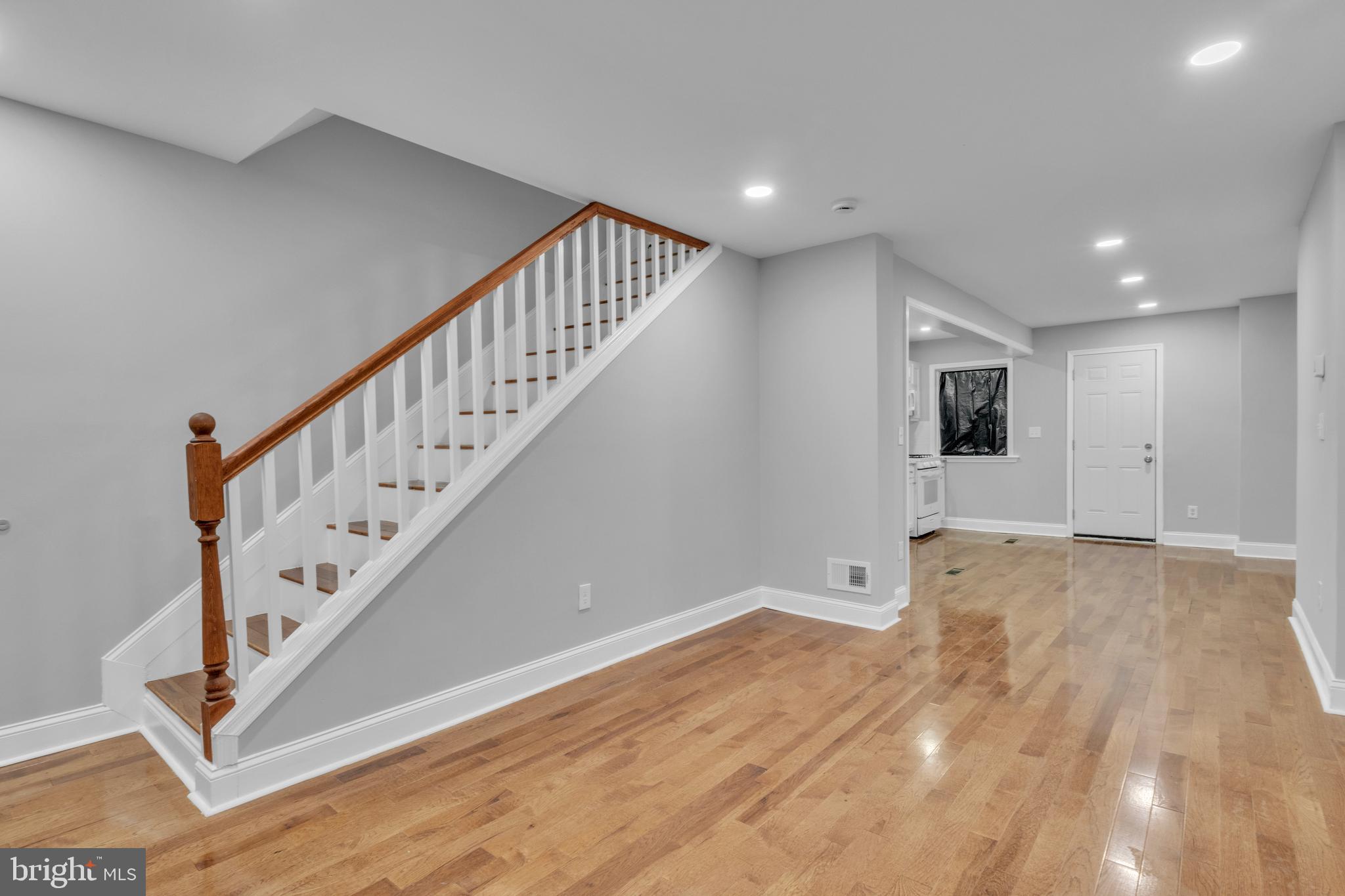 3606 Manchester Avenue Baltimore, MD 21215 - Photo 3 of 21 a view of an entryway with wooden floor