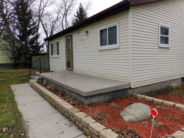 8108 Pardee Road Taylor, MI 48180 - Photo 4 of 58 04. LG (18X6) INVITING FRONT PORCH ~ A GREAT SPOT FOR YOUR MORNING COFFEE!