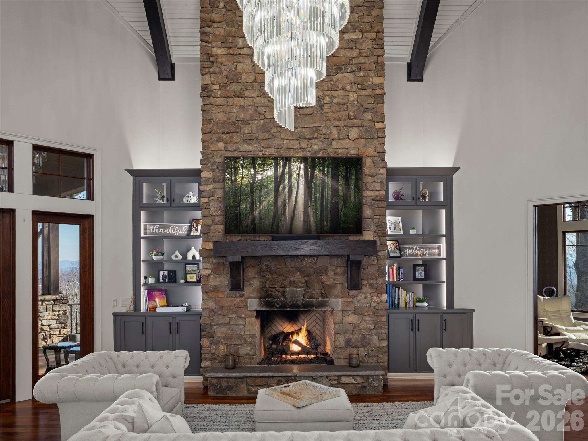 47 Ridge Pine Trail Arden, NC 28704 - Photo 16 of 48 a living room with furniture and a fireplace