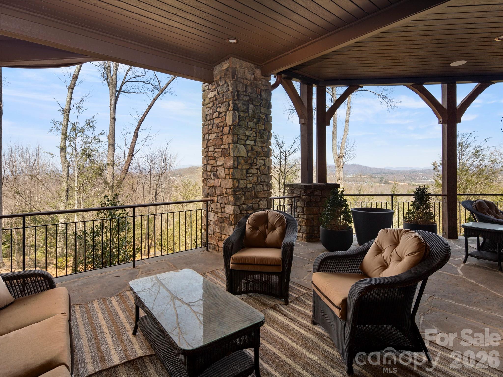 47 Ridge Pine Trail Arden, NC 28704 - Photo 17 of 48 a balcony with furniture and a large window
