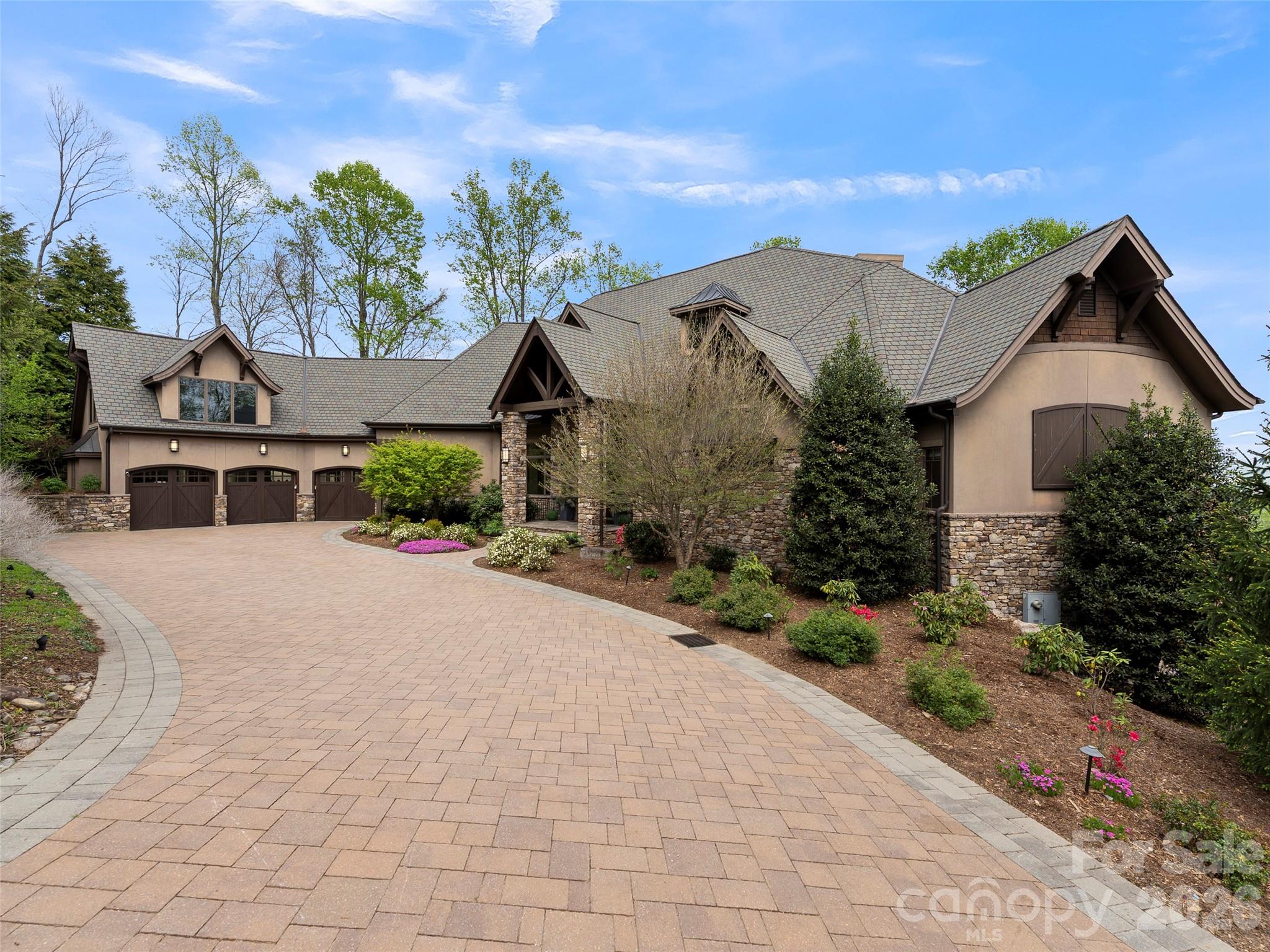 47 Ridge Pine Trail Arden, NC 28704 - Photo 23 of 48 a front view of a house with a yard and garage
