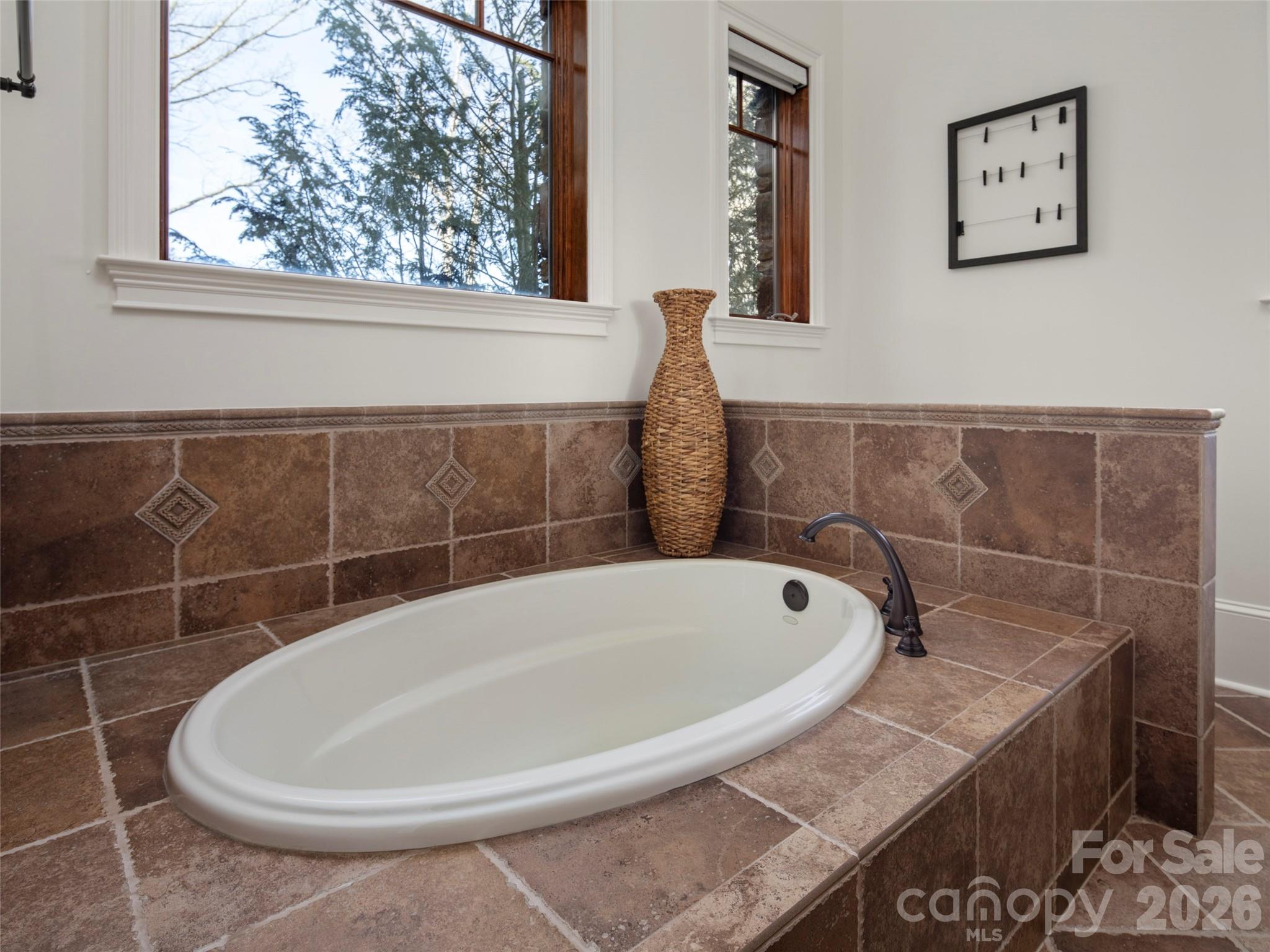 47 Ridge Pine Trail Arden, NC 28704 - Photo 43 of 48 a bath tub sitting in a bathroom next to a window