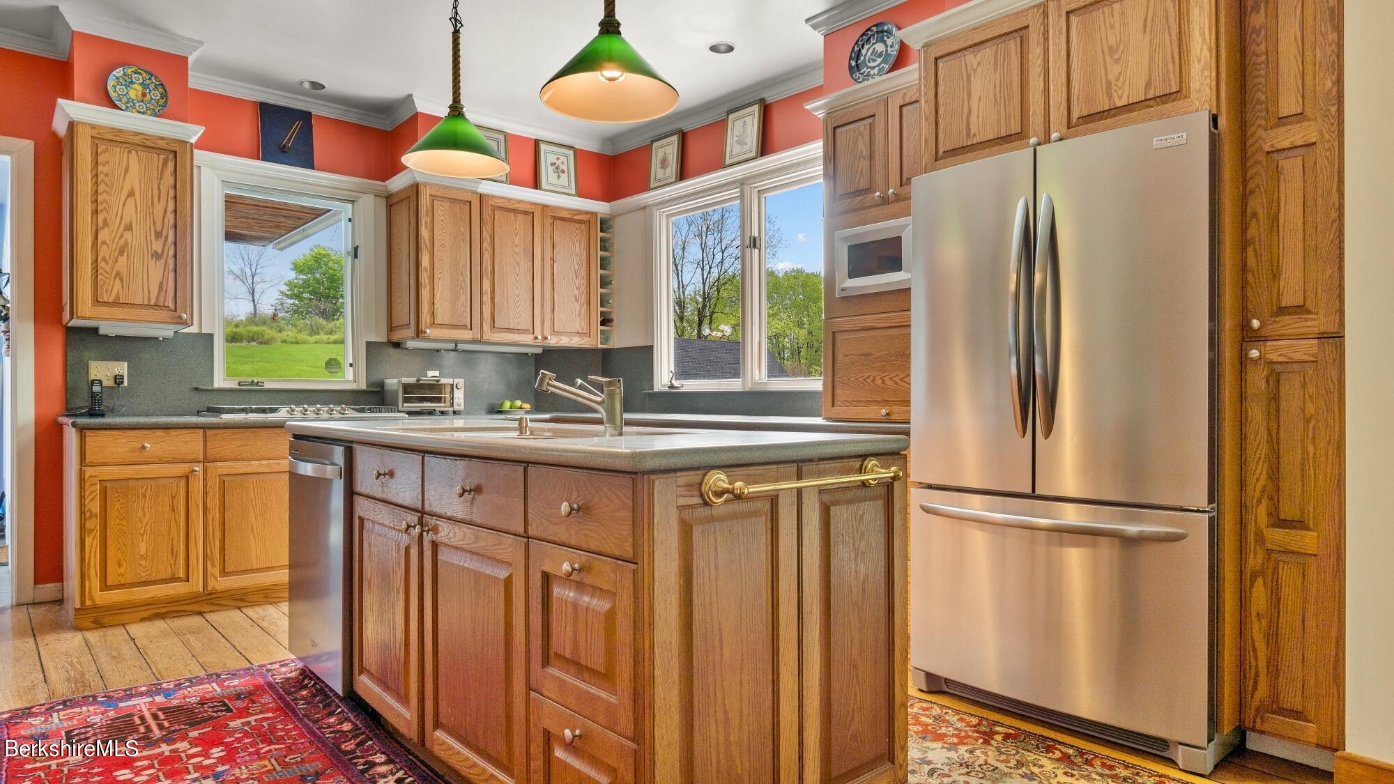 25 Cross Road West Stockbridge, MA 01266 - Photo 14 of 44 a kitchen with stainless steel appliances granite countertop a refrigerator and a sink