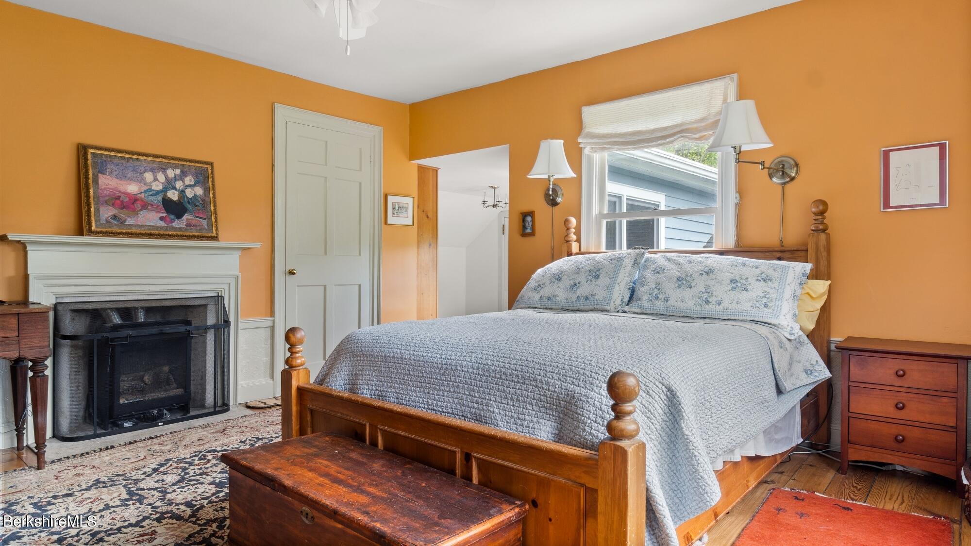 25 Cross Road West Stockbridge, MA 01266 - Photo 20 of 44 a bedroom with a bed and a fireplace